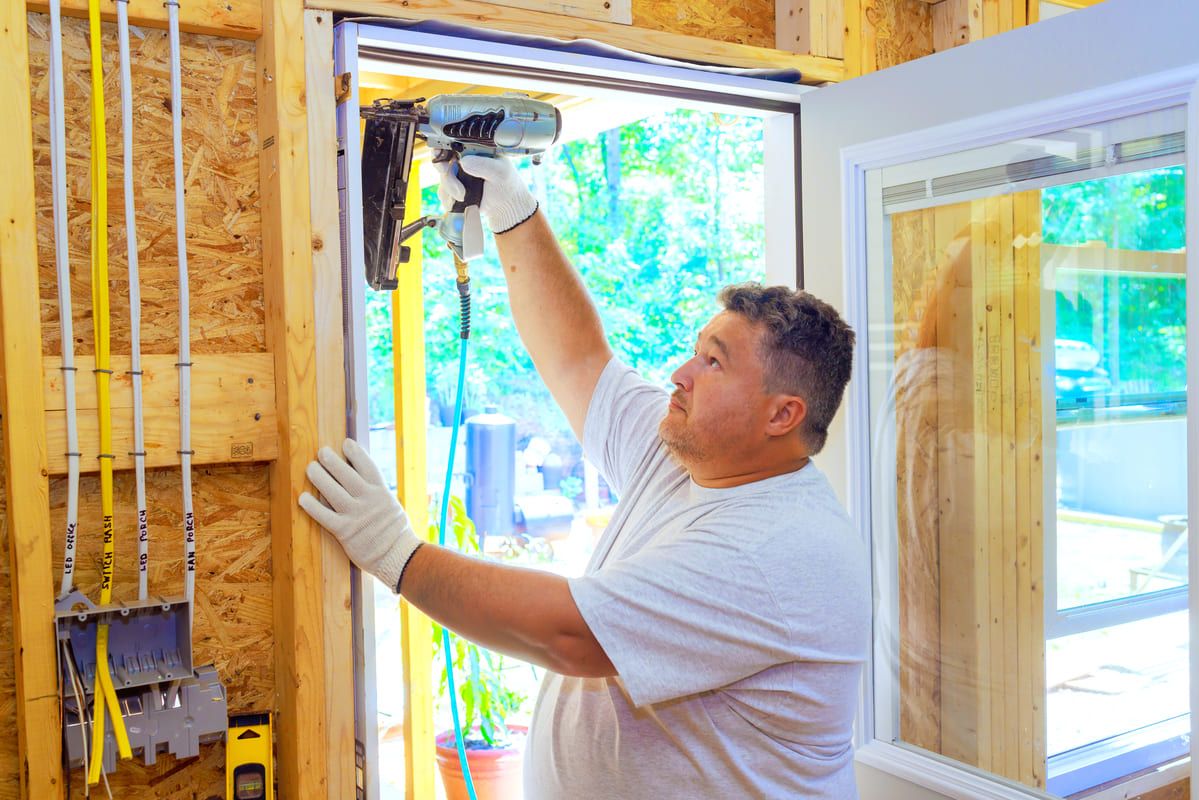 carpenter-is-using-pneumatic-nail-gun-to-install-n-2025-03-27-03-45-43-utc (1) (1).jpg