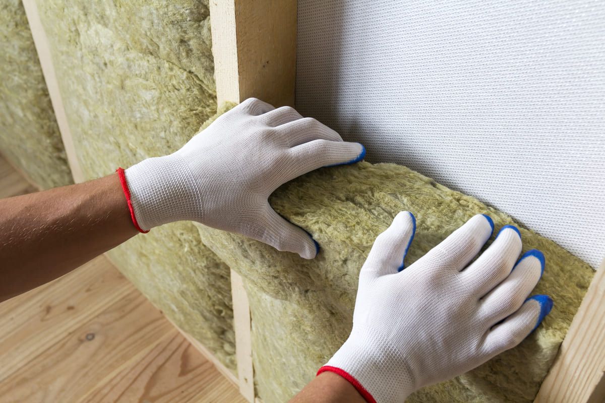 close-up-of-worker-hands-in-white-gloves-insulatin-2024-12-06-15-58-58-utc (1) (1).jpg
