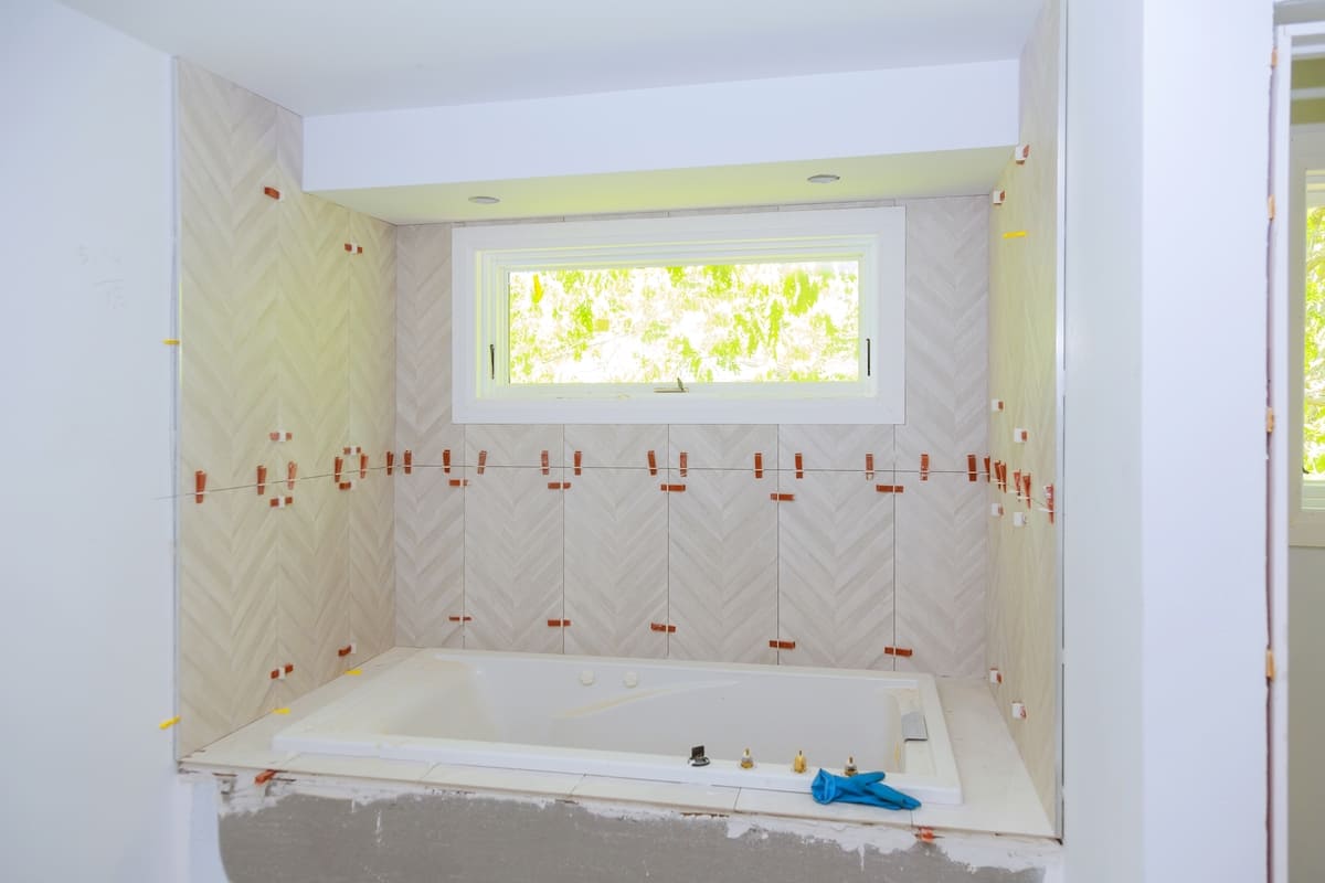 construction-installing-ceramic-tile-on-reconstruc-2025-03-27-06-11-40-utc (2) (1).jpg