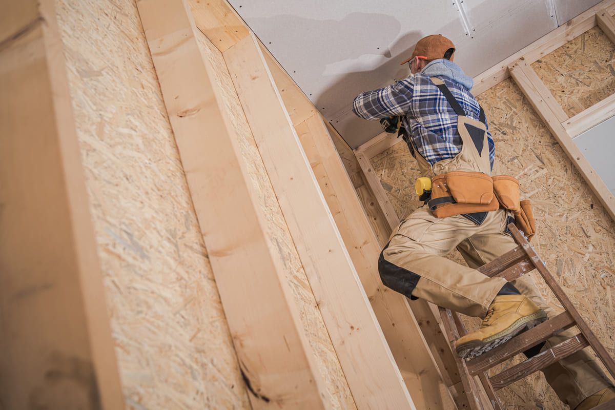construction-worker-performing-ceiling-installatio-2025-03-15-22-11-31-utc (1) (2).jpg