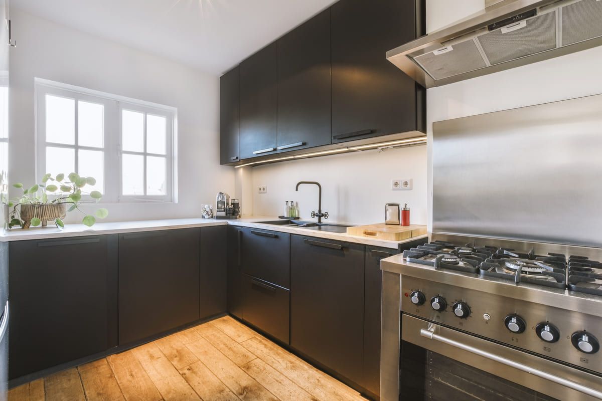 corner-kitchen-with-black-cabinets-2025-02-10-08-49-17-utc (1) (1).jpg