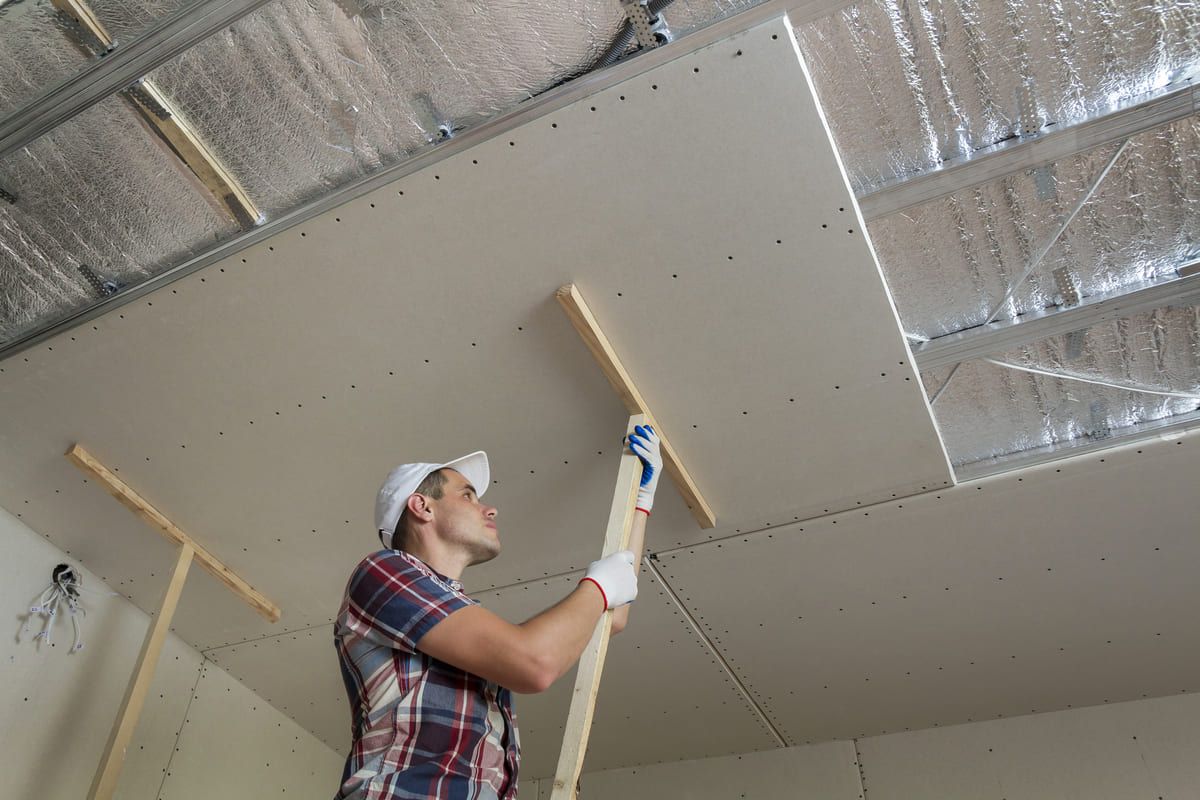 young-worker-in-protection-work-gloves-fixing-wood-2024-12-06-01-24-29-utc (1) (1).jpg